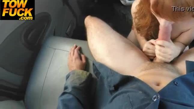 Redhead babe sucks off driver on camera
