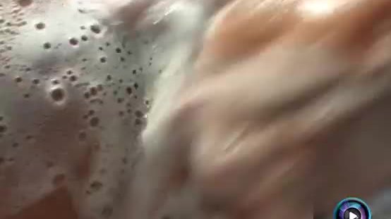 Maria Belucci gets wet and soaped up with her luscious tits and cunt